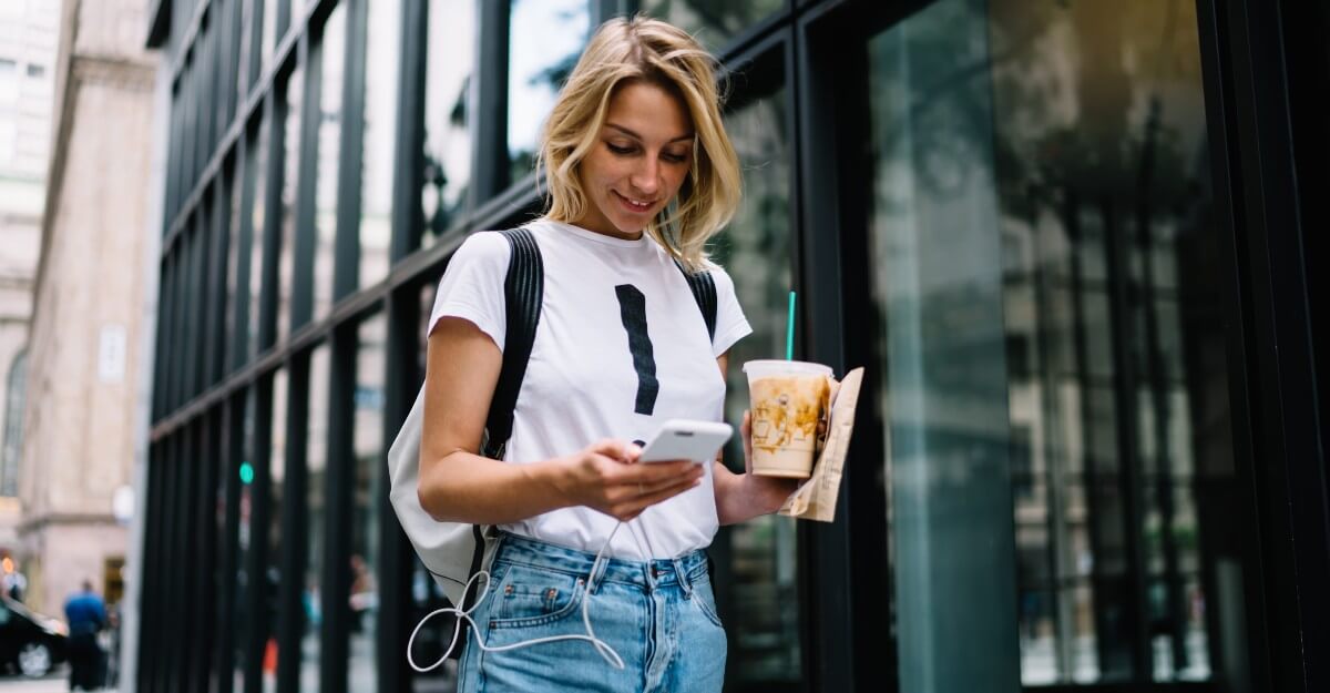 Girl Walking Through City